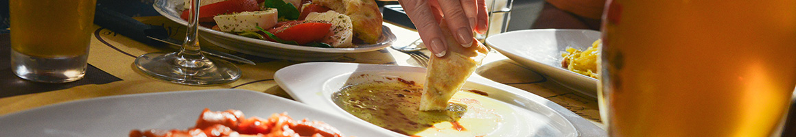 Eating Mediterranean Spanish Tapas/Small Plates at Paella House restaurant in Orlando, FL.